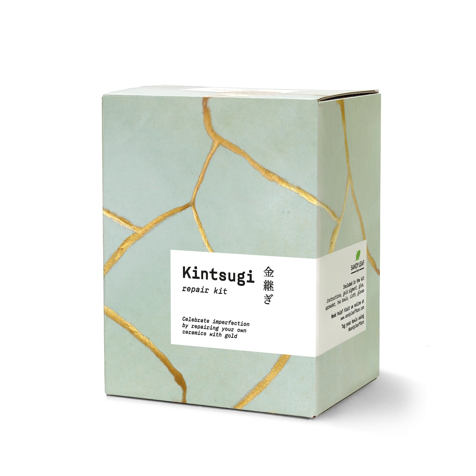 Kintsugi kit repairing a ceramic bowl with golden seams, a pottery gift for ceramics lovers