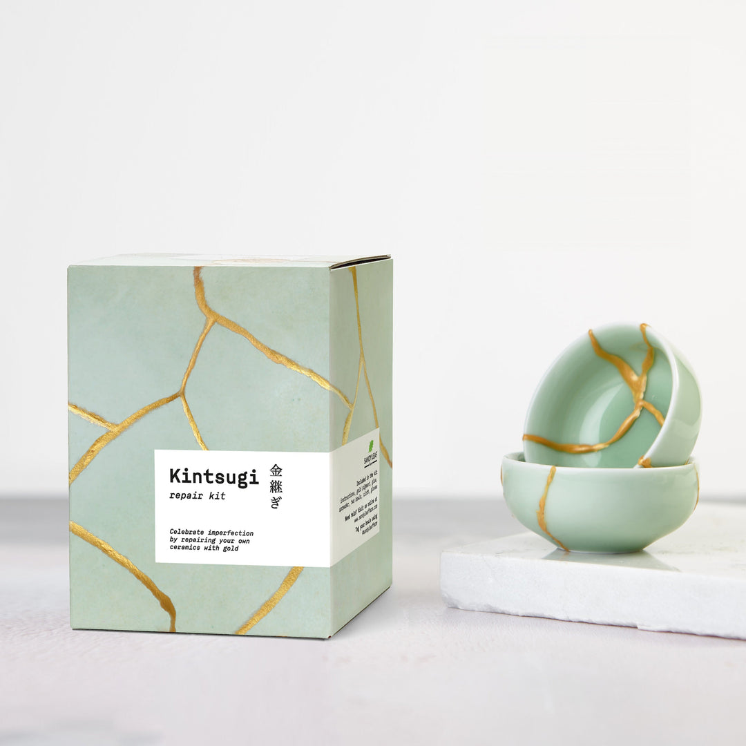 Sandy Leaf Farm Kintsugi Repair Kit box with gold-repaired ceramic bowls